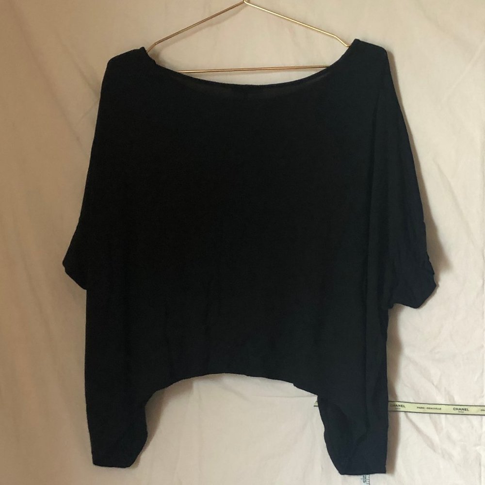 . Black Maitai tee with a purposely uneven hem